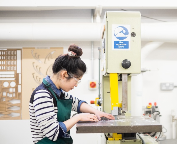 Student using architecture equipment