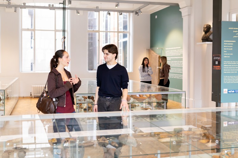Students discussing the artefacts in the museum. 