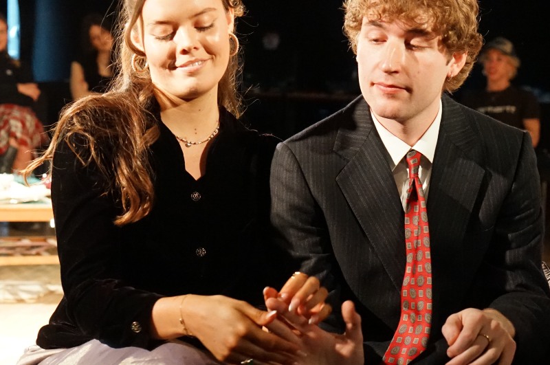 Students in a drama performance. 