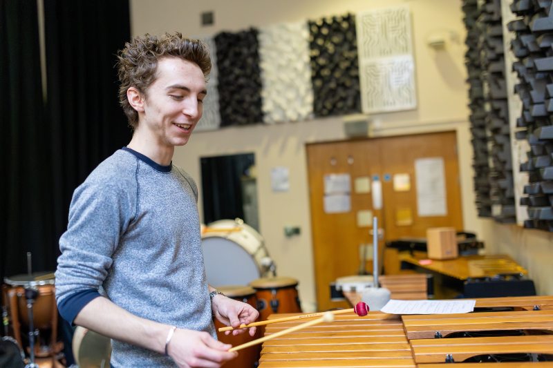 Student playing music
