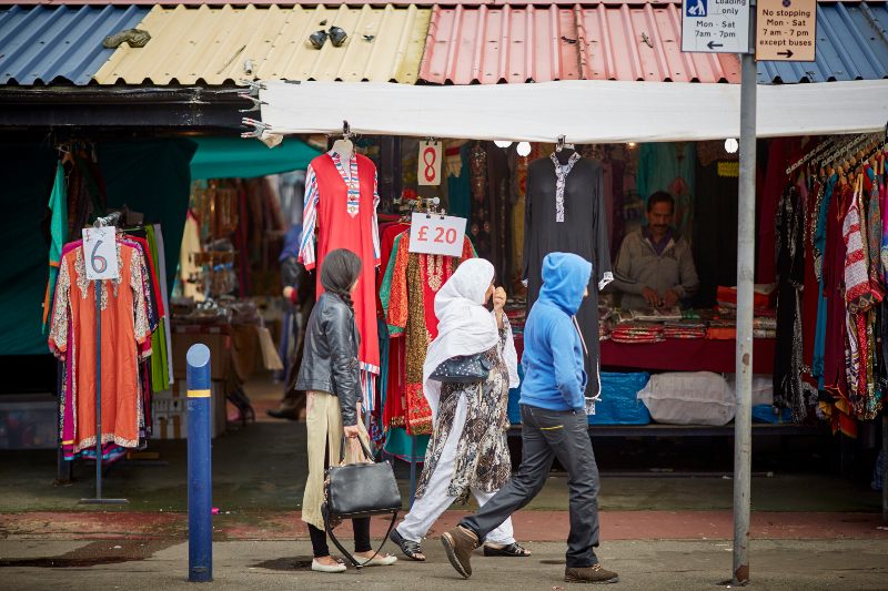 Manchester street market highlighting diversity and informal economies in the city. 